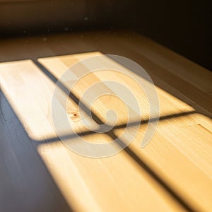 Sunlight filters through a window, casting