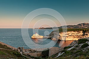 Sunlight on lighthouse at entrance to Bonifacio harbour in Corsica