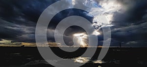 A sunlight mangling the rainy cloud