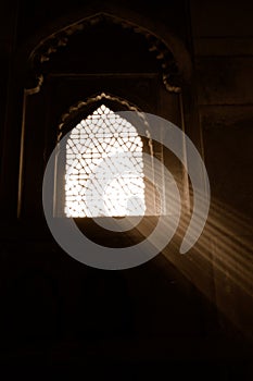 Sunlight through ornate window