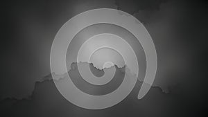 Sunlight piercing through dark clouds