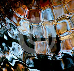 Sunlight Reflecting on Square Pond Ripples