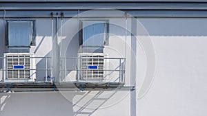 Ventilation equipment in EVAP air conditioning system on industrial building wall