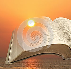 Sunlight shine through bible pages