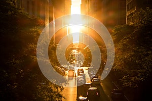 Sunlight shines between buildings of Midtown Manhattan New York City