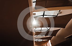 Sunlight shines from ceiling in the hall
