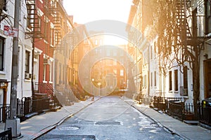 Sunlight shines on historic buildings along Gay Street in New York City