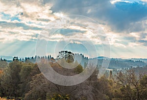 Sunlight Shinning Through the Clouds