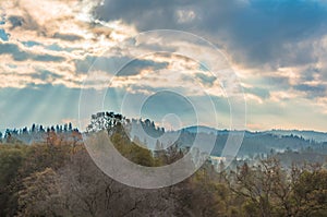 Sunlight Shinning Through the Clouds