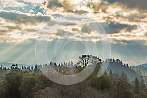 Sunlight Shinning Through the Clouds