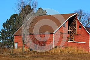 Red Barn with hay loft door missing