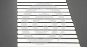 Sunlight Stripes Pattern on Gray Wall Through Blinds