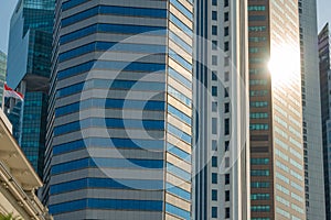 Sunlight of sun reflect on mirror of skyscraper