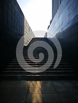 Sunlit being reflected on the stairs