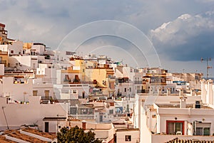 Sunlit houses and apartments in the Costa Tropical town of La Herradura, Granada, Spain photo