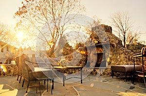 Sunlit Patio With Stone Fireplace