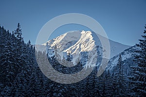 Sunlit peak in Western Tatras