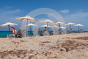 Sunloungers on the beach photo