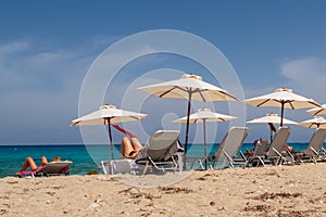 Sunloungers on the beach photo