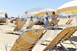 Sunloungers and umbrellas in a beach
