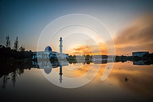Sunning vibrant sunrise with reflection at UNITEN Mosque,