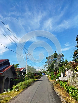Sunny atmosphere with blue Sky in Gunung Perak village photo