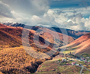 Sunny autumn scene in the famous highest inhabited village in Eu