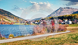 Sunny autumn view of Monteplair village, Resia lake location, Itay, Europe. Splendid morning scene of Italian Alps. Traveling conc