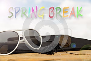 Sunny background with the word spring break