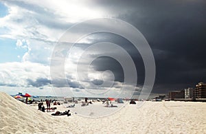 Sunny Beach with Storm Clouds photo