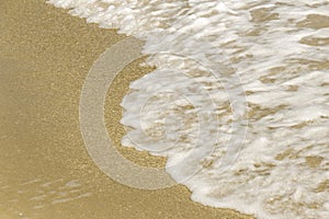 Beach sea waves with foam