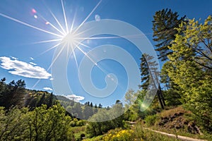 Sunny cloudless sky with bright sunlight