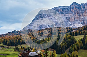 Sunny colorful autumn alpine Dolomites mountain scene, Sudtirol, Italy. Peaceful view from alpine path road