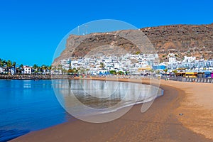 sunny day on a beach at Puerto de Mogan at Gran Canaria, Canary islands, Spain photo