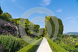 Sunny day with a clear blue sky in the gardens of the Powis Castle in the UK