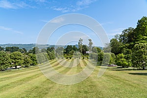 Sunny day with a clear blue sky in the gardens of the Powis Castle in the UK