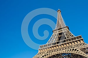 Sunny day at Eiffel Tower in Paris , France