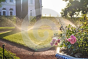 Sunny day and irrigation sprinklers at Summer Garden, St. Petersburg