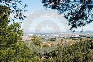 Sunny day at Los Cerros Park. View of outskirts of Alcala de Henares, Madrid photo
