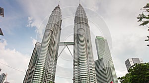 Sunny day petronas twin towers kuala lumpur city center view 4k time lapse malaisia