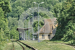 Sunny day, on the platform of an old forgotten mountain railway station