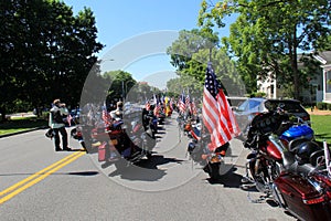 Sunny day with road full of motorcyclists ready to take part in parade, Saratoga, New York, 2016