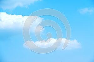 There are two clouds floating in the blue skyÃ¯Â¼Åwhich can be used as the background. photo