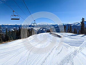 sunny day on slopes in breckenridge colorado ski resort