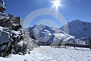 Sunny day snow on top of mountain stock photo