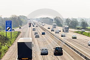 Sunny day view of UK motorway traffic