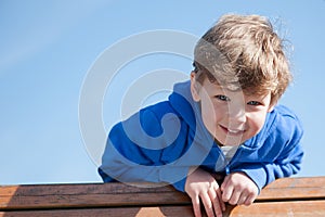 Sunny Day Young Boy Looking Down