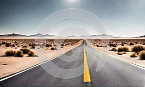 Sunny desert landscape with an asphalt road