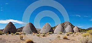 Sunny exterior view of the huge oven of Ward Charcoal Ovens State Historic Park