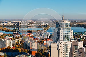 Sunny golden autumn Voronezh. Aerial view from skyscraper roof heigh photo